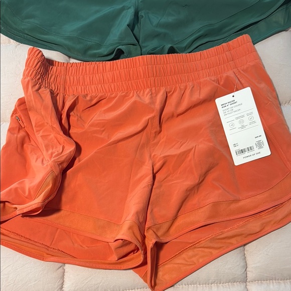 Women's Athleta Green and Orange Shorts - Picture 2 of 4